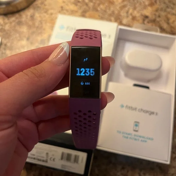 Fitbit Charge 3 with Purple Band - Picture 1 of 4